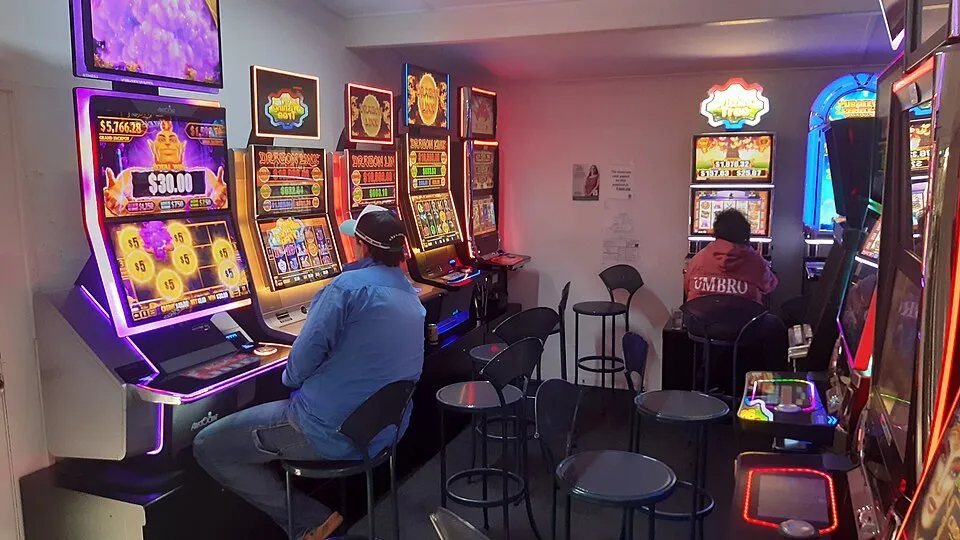 Illustration: Pokies Dominate Harm: State-by-State Regulations and $12 Billion in Annual Losses